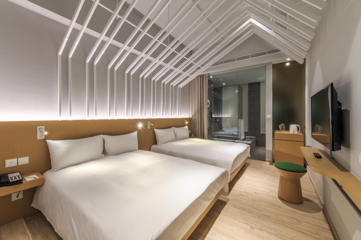 superior quadruple room, 2 double beds | 1 bedroom, down duvets, blackout curtains, iron/ironing board