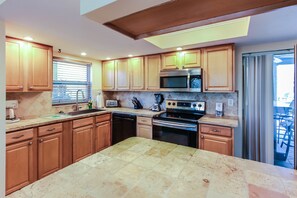 Condo, 3 Bedrooms | Private kitchen | Coffee/tea maker, blender, cookware/dishes/utensils - Cape Coral Seatuit- #A (Cape Coral)