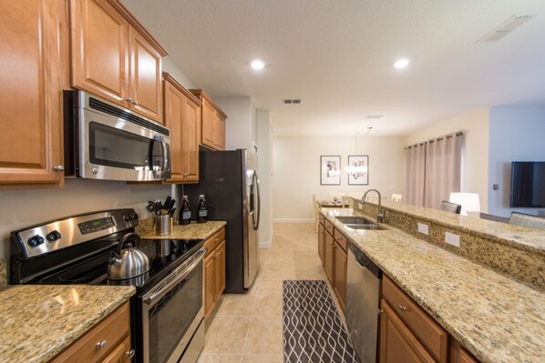 Townhome, 4 Bedrooms | Private kitchen | Cookware/dishes/utensils