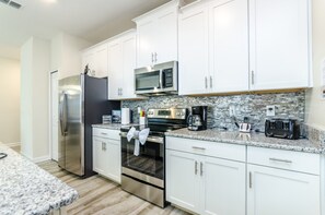 Townhome, 4 Bedrooms | Private kitchen