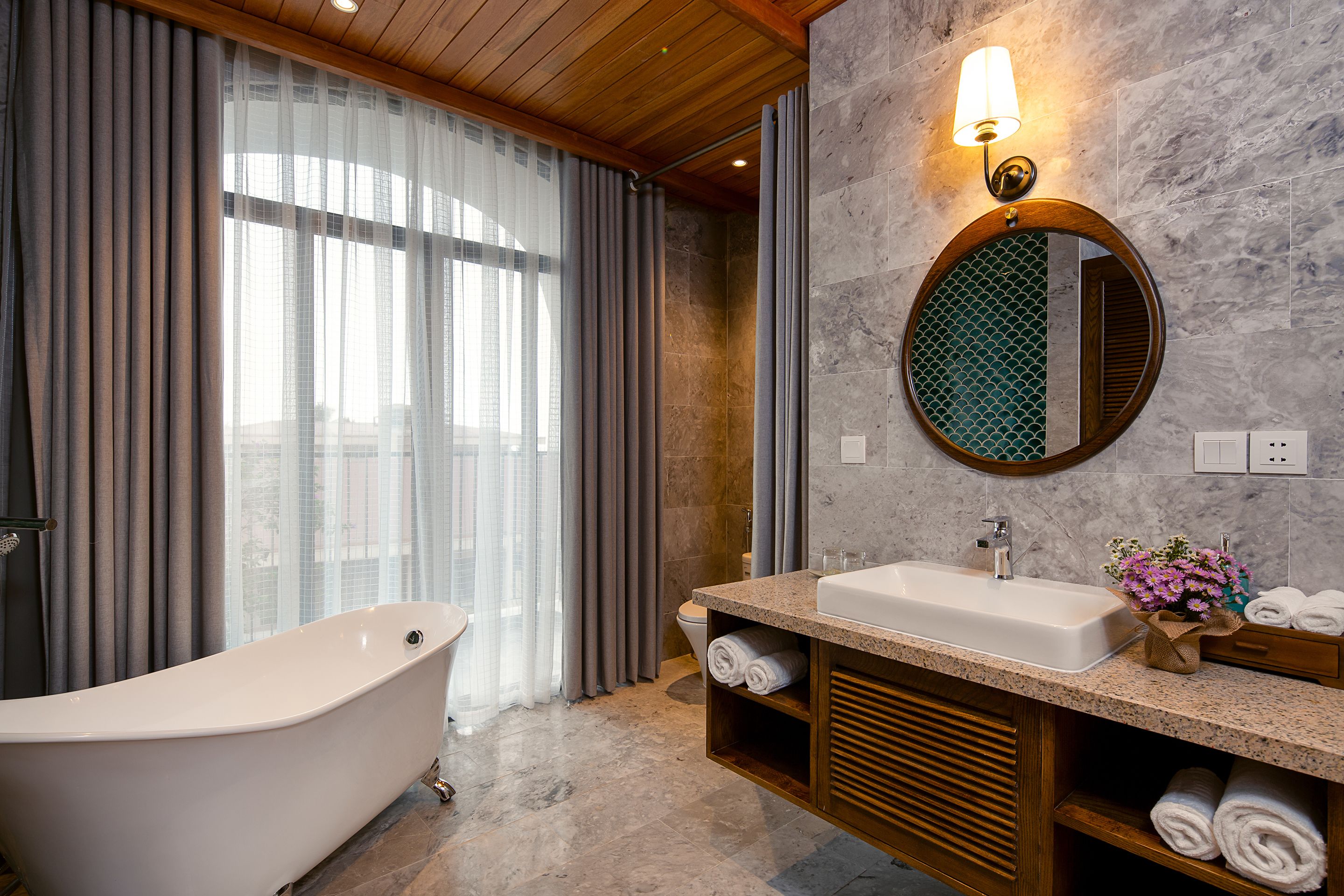 2-bedroom suite | bathroom | deep-soaking bathtub, free toiletries, hair dryer, slippers