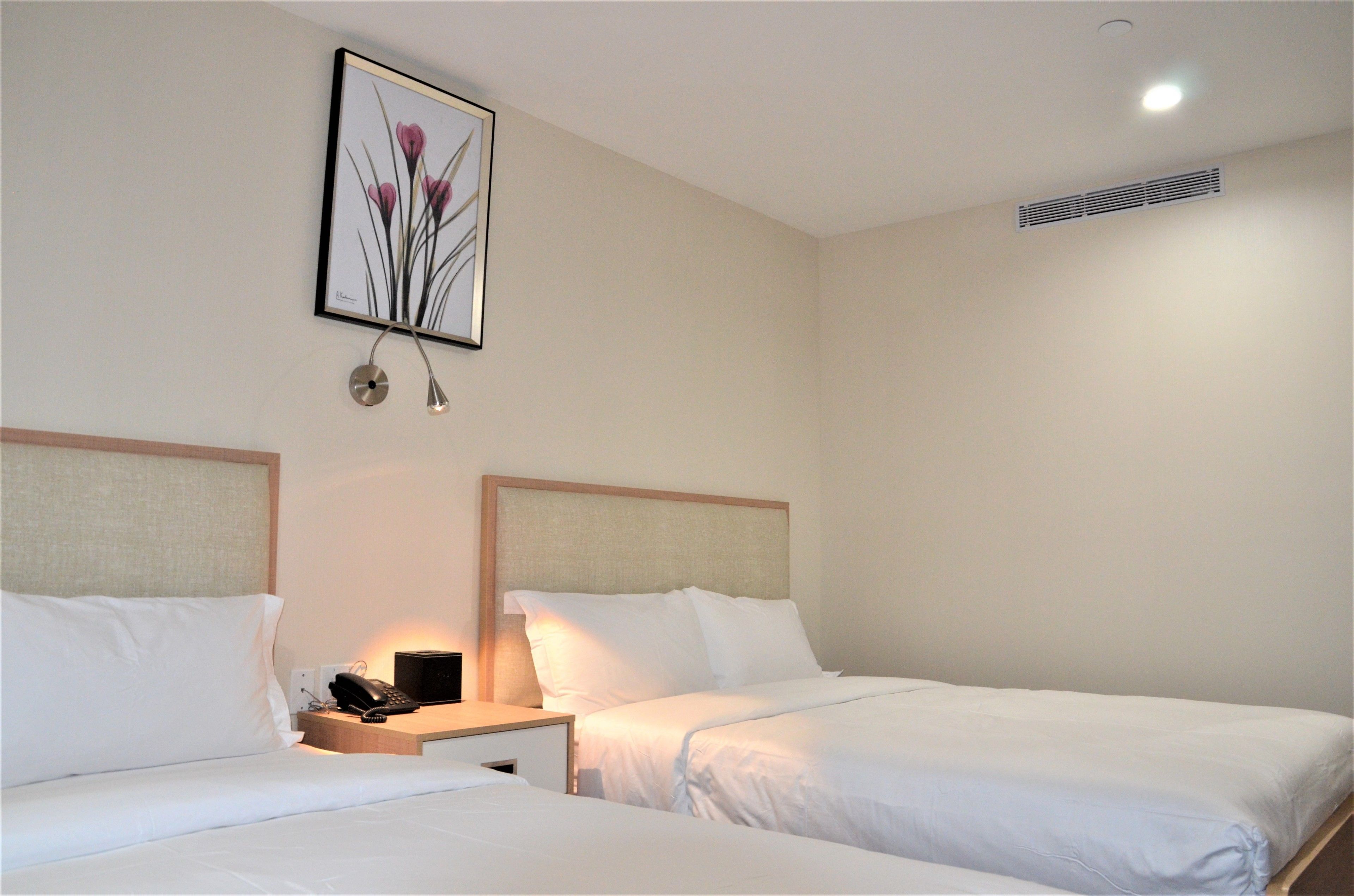 classic double room, 2 queen beds | down duvets, desk, soundproofing, iron/ironing board