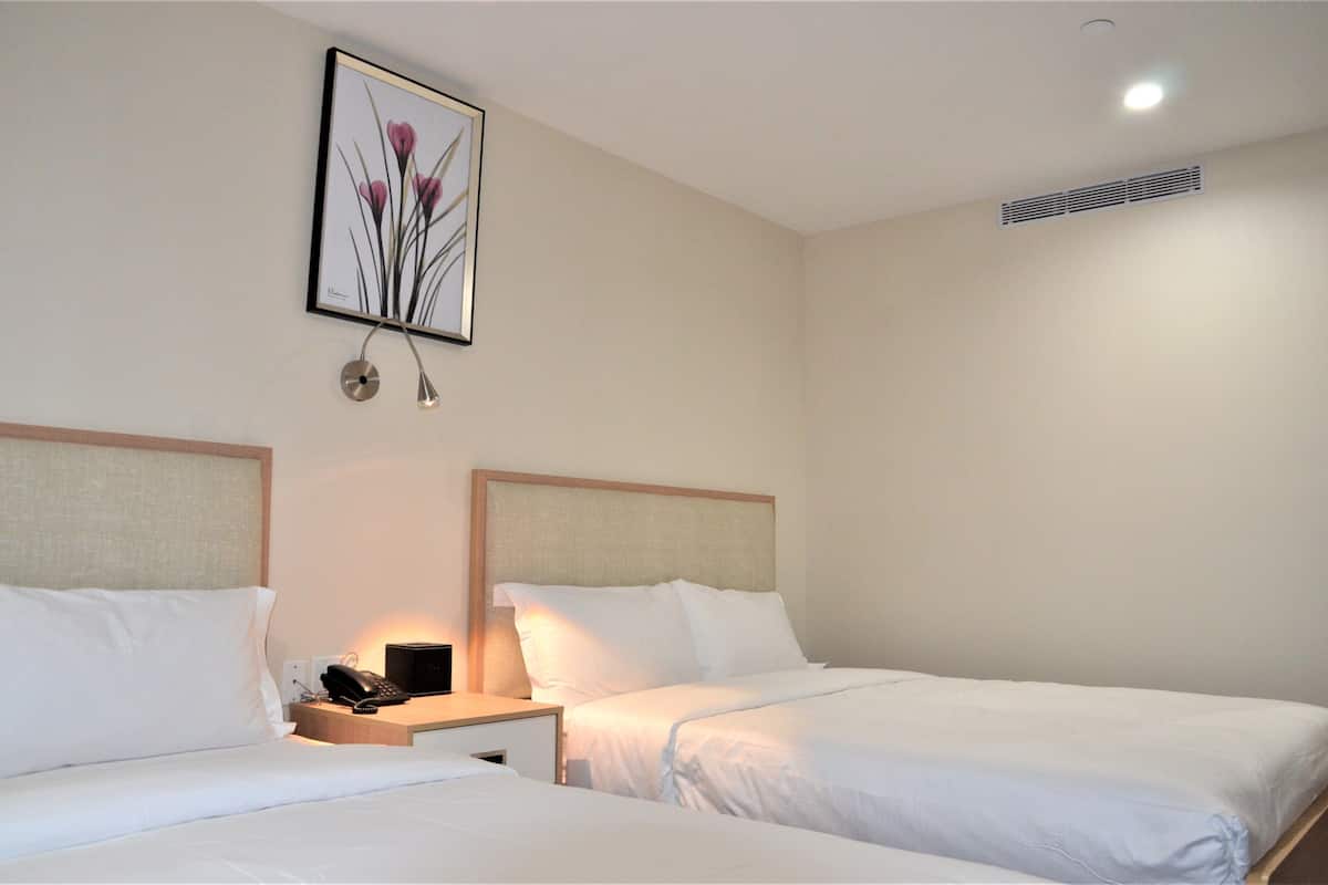 classic double room, 2 queen beds | down duvets, desk, soundproofing, iron/ironing board