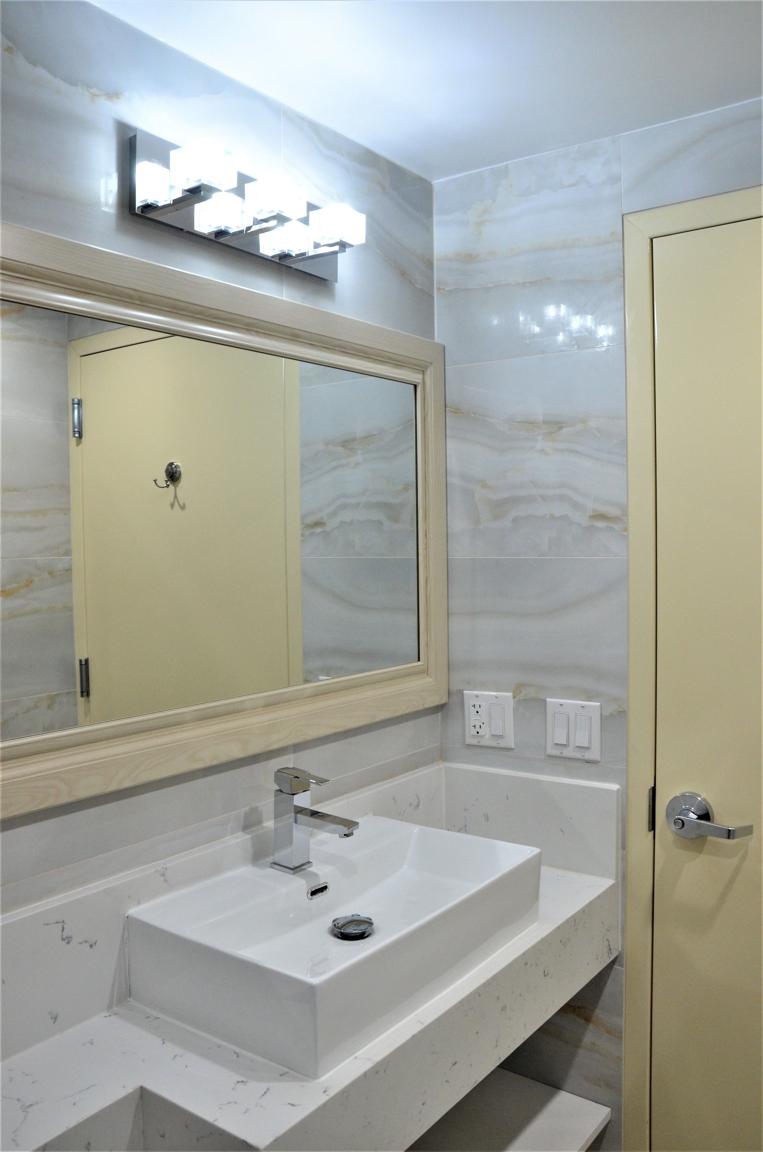 deep-soaking bathtub, rainfall showerhead, free toiletries, hair dryer