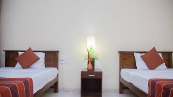 Deluxe Room, 1 Bedroom, Hill View | Rollaway beds, bed sheets