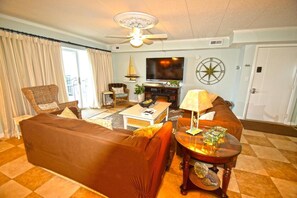Condo, 2 habitaciones | Área de sala de estar