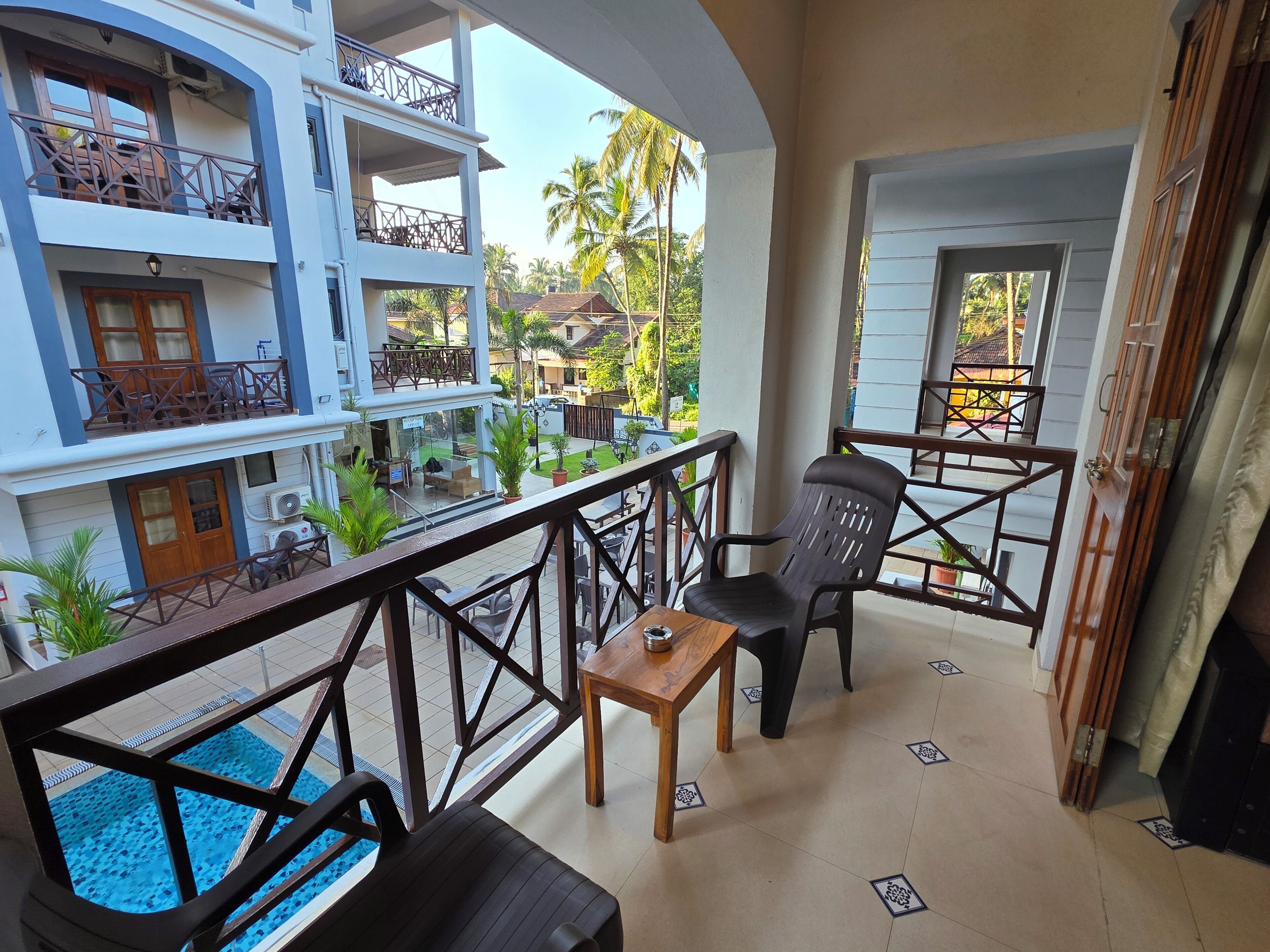 Apartment with Pool View | Memory-foam beds, in-room safe, laptop workspace, blackout curtains