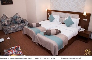 Ropa de cama de alta calidad y minibar 