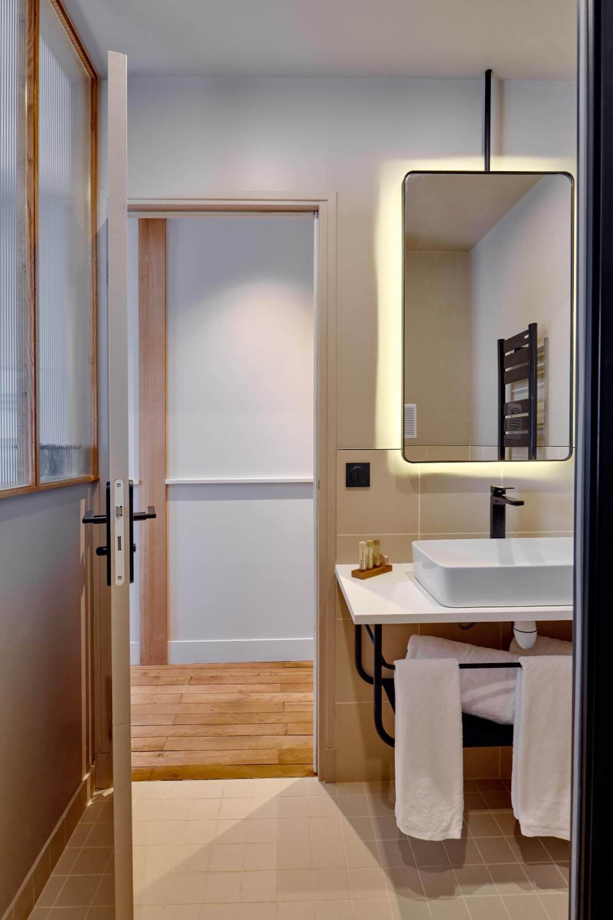 shower, designer toiletries, hair dryer, towels