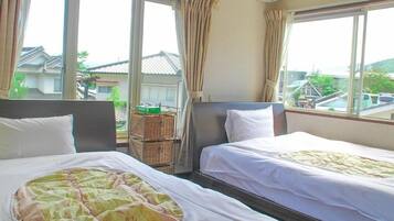 Twin Room | Down comforters, desk, free WiFi, bed sheets