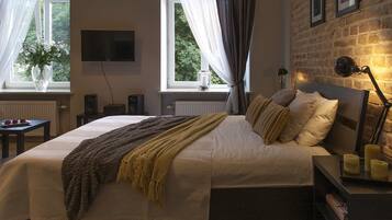 Apartment, 1 Queen Bed | Iron/ironing board, free WiFi, bed sheets