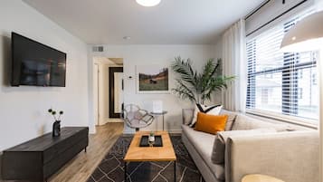 Apartment, Courtyard View | Living area | 42-inch flat-screen TV with cable channels, TV, streaming services