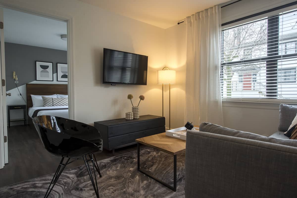 Apartment, Courtyard View | Living area | 42-inch flat-screen TV with cable channels, TV, streaming services
