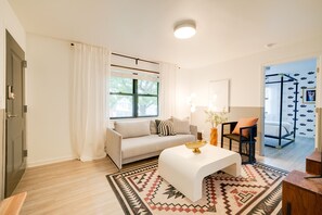 Apartment, Courtyard View | Living area | 42-inch flat-screen TV with cable channels, TV, streaming services - Abode Nashville - Marathon Village Near Downtown (Nashville)