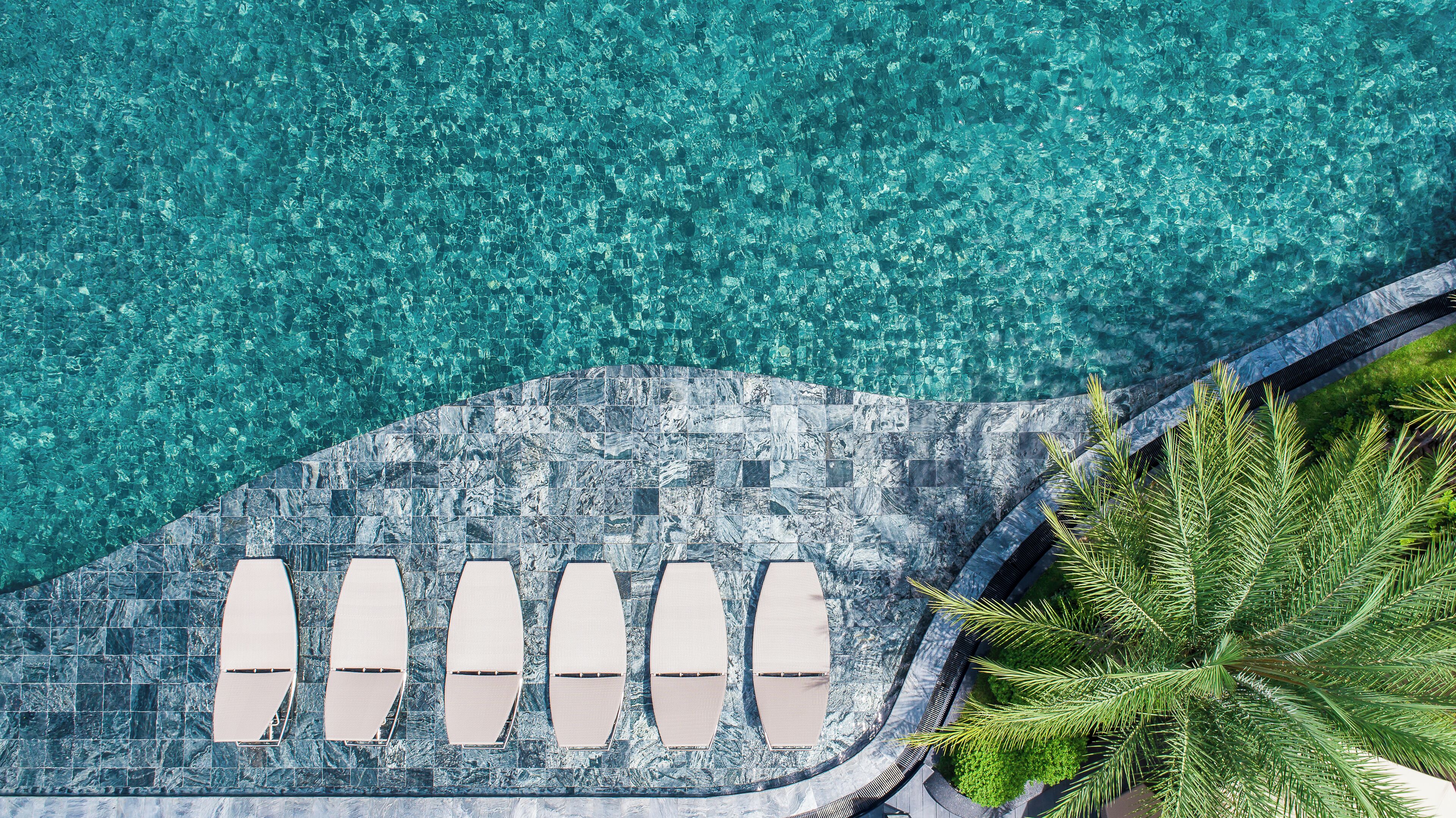 Grand Deluxe Pool View Room | 1 bedroom, in-room safe, individually decorated, blackout drapes