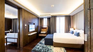 Premier Suite Room | 1 bedroom, in-room safe, individually decorated, blackout drapes