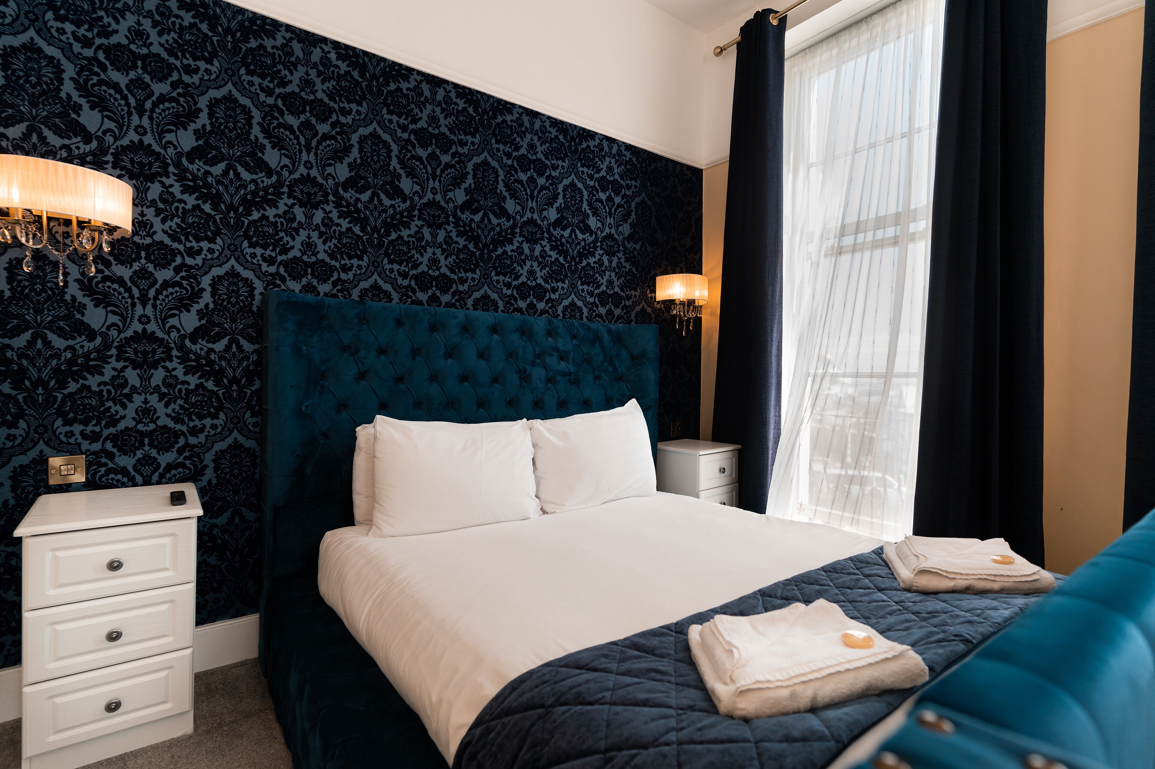 family room, sea view | desk, iron/ironing board, free wifi, bed sheets