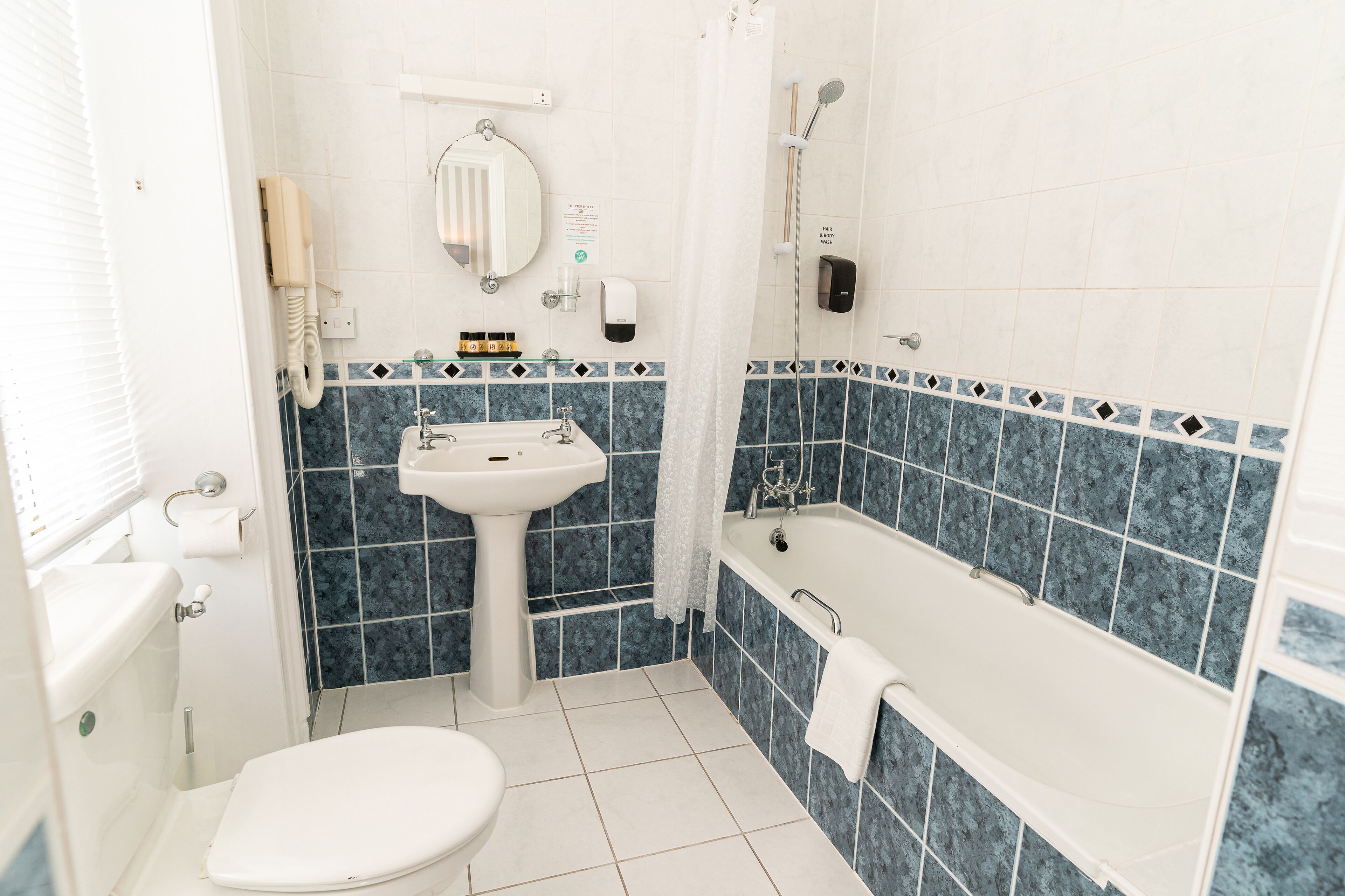 deluxe twin room, sea view | bathroom | free toiletries, hair dryer, towels