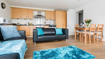 Apartment, 2 Bedrooms | Living area | Flat-screen TV