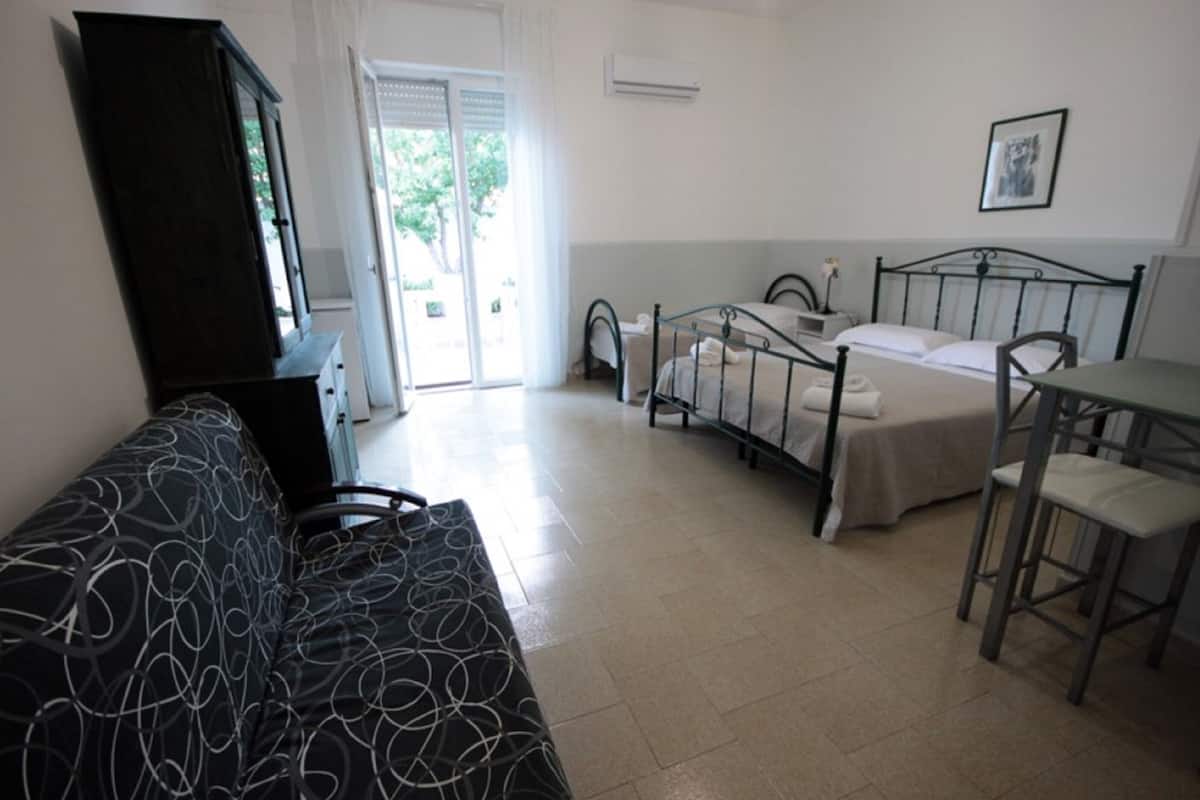 Classic Apartment, 2 Bedrooms, Patio | Travel crib, free WiFi, bed sheets