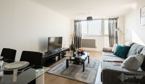 Apartment, 1 Bedroom | Living area | Flat-screen TV