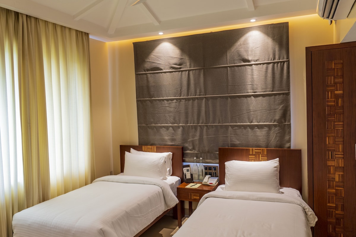 premium garden view twin room | 1 bedroom, premium bedding, memory-foam beds, in-room safe