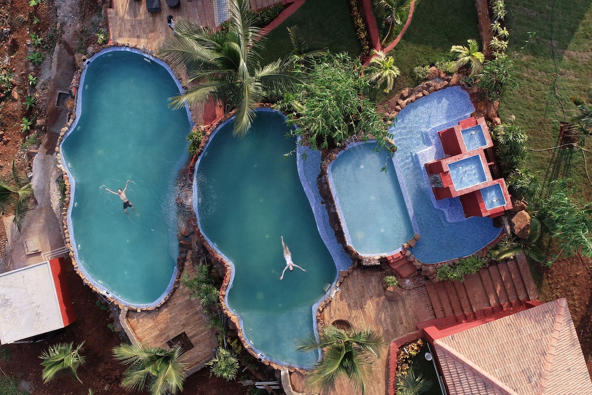 3 outdoor pools, open 8:00 am to 6:00 pm, pool umbrellas, pool loungers