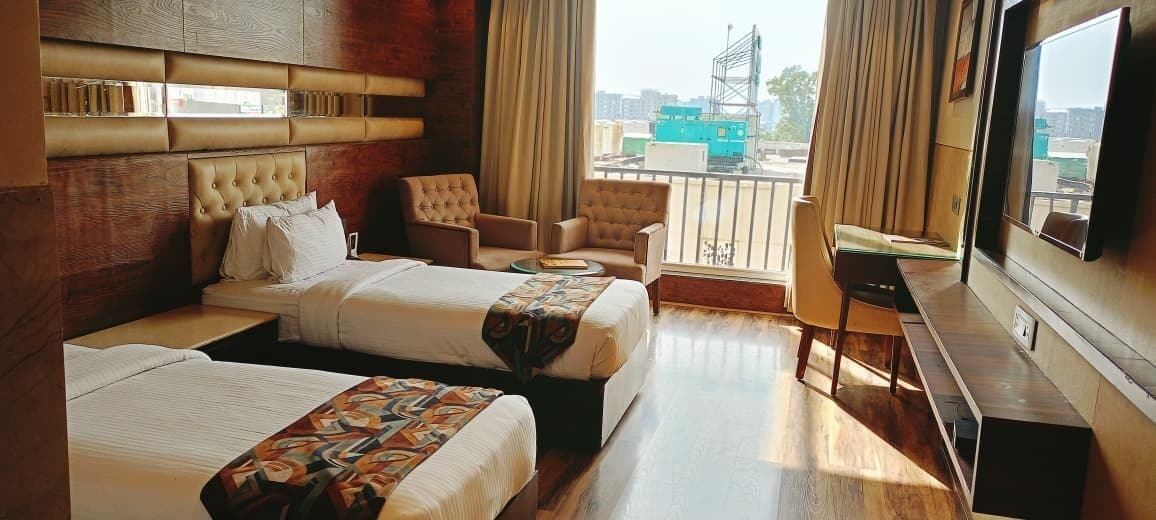 Premium Twin Room, 2 Bedrooms, Partial Ocean View | Individually decorated, individually furnished, desk, laptop workspace