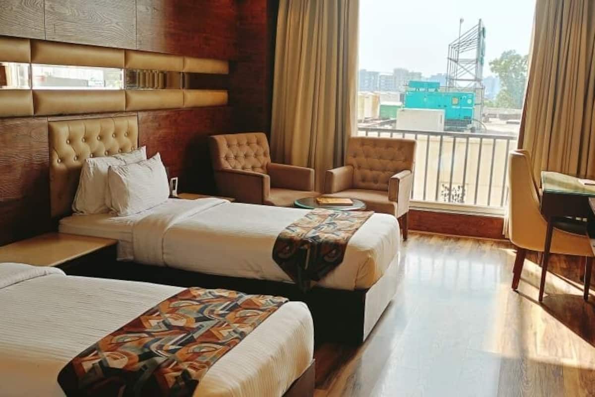 Premium Twin Room, 2 Bedrooms, Partial Ocean View | Individually decorated, individually furnished, desk, laptop workspace