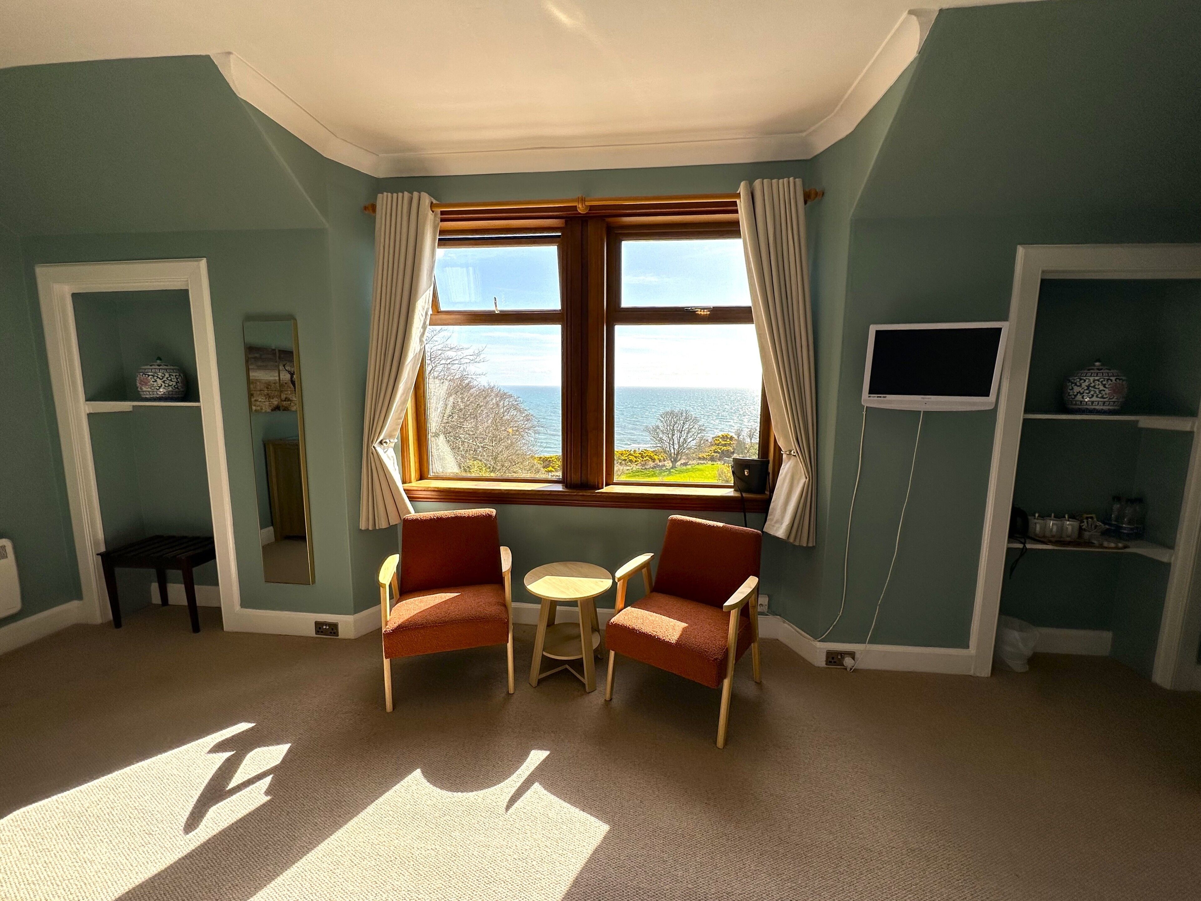 family room | premium bedding, individually decorated, individually furnished