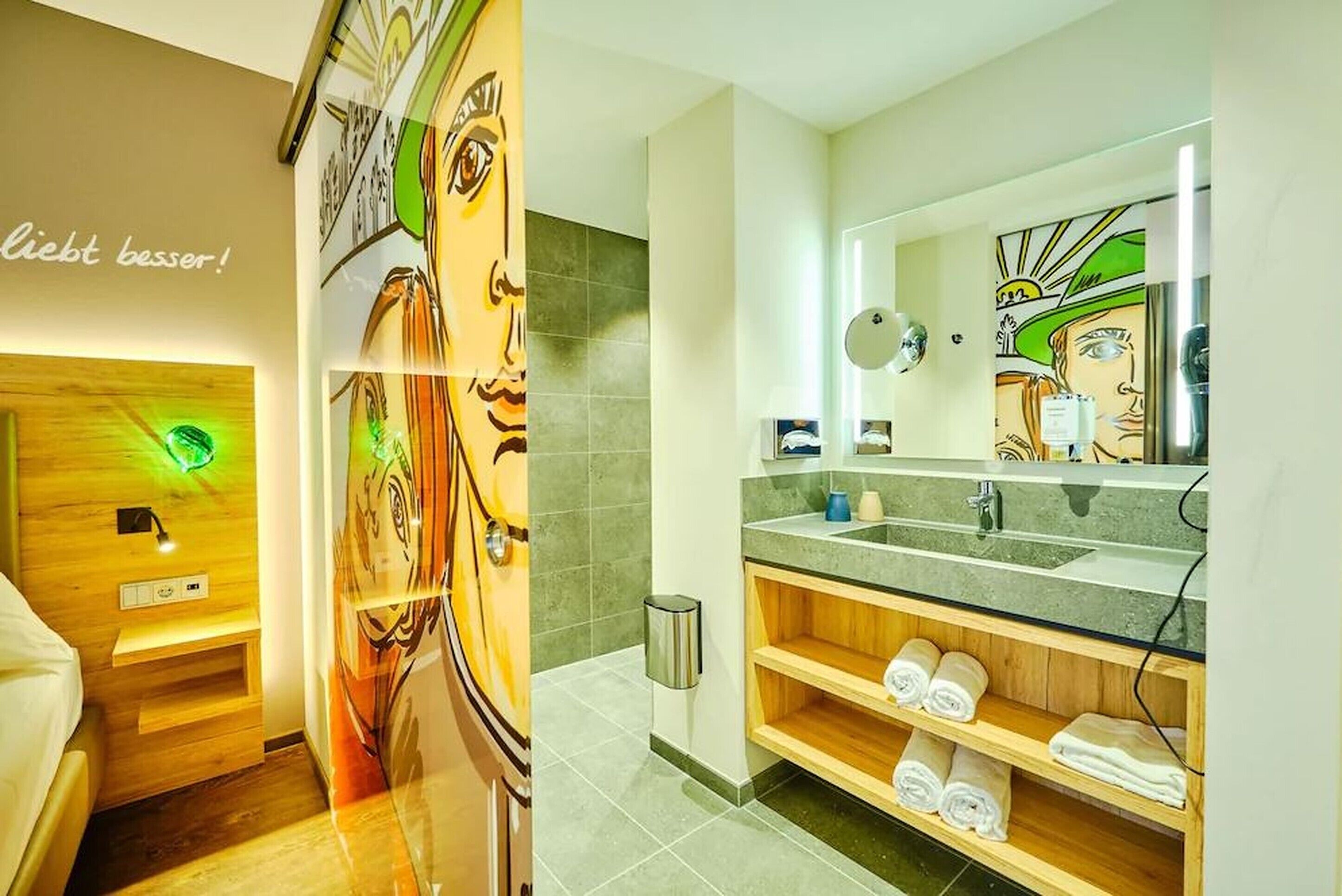 junior suite | bathroom | shower, free toiletries, hair dryer, bathrobes