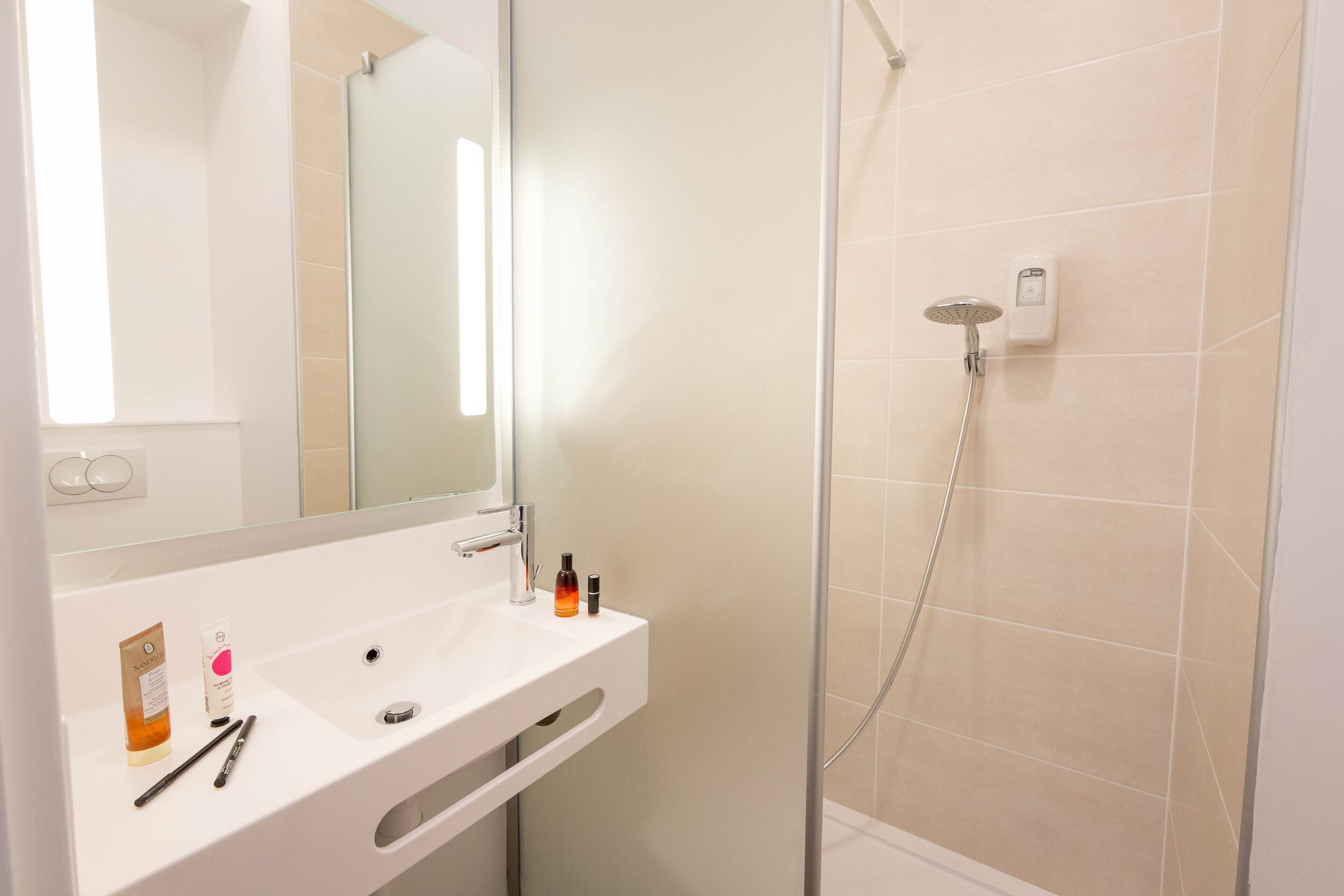 shower, towels, soap, toilet paper