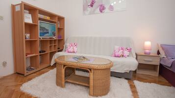 Standard Studio, Sea View | Living area | Flat-screen TV