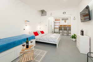 Departamento | 1 habitación, tabla de planchar con plancha, wifi gratis y ropa de cama 