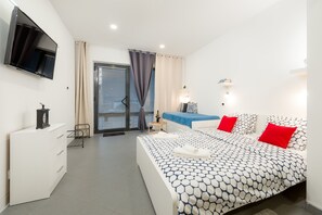 Departamento | 1 habitación, tabla de planchar con plancha, wifi gratis y ropa de cama 