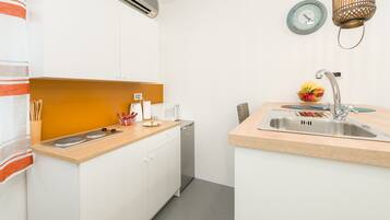 Apartment | Private kitchenette | Fridge, microwave, stovetop, electric kettle