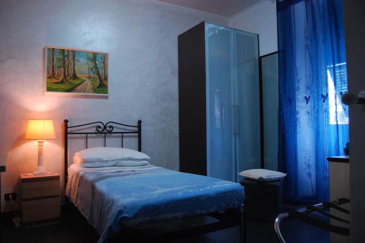 Ropa de cama de alta calidad y tabla de planchar con plancha