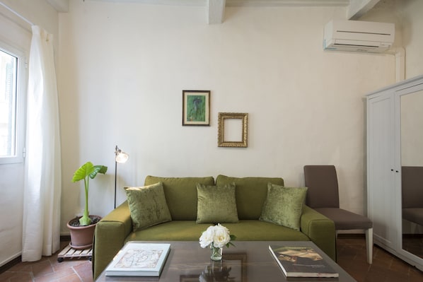 Apartment, 1 Bedroom | Living area | Flat-screen TV