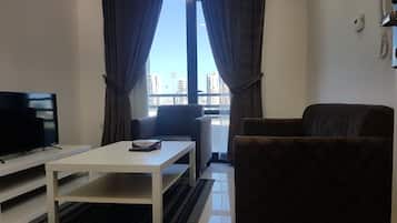 42-inch flat-screen TV with satellite channels, TV