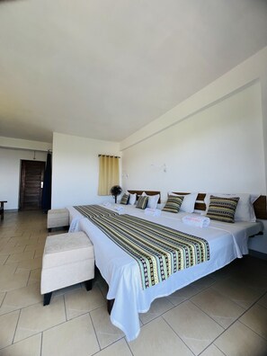Family Room, Multiple Beds, Mountain View | In-room safe, desk, laptop workspace, soundproofing - Hotel Ambatoloaka (Nosy Be)