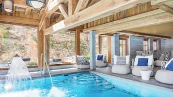 Indoor pool, pool umbrellas, sun loungers
