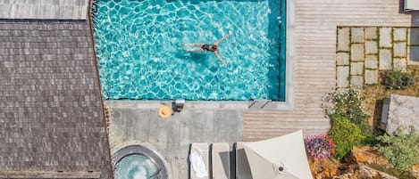 Indoor pool, pool umbrellas, sun loungers