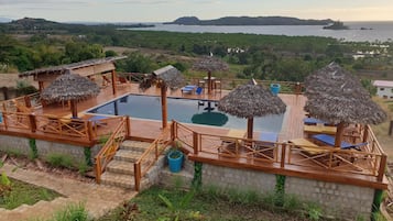 2 outdoor pools, open 8:30 AM to 10:30 PM, pool loungers