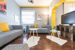 Family Apartment, 2 Bedrooms | Living room | Flat-screen TV