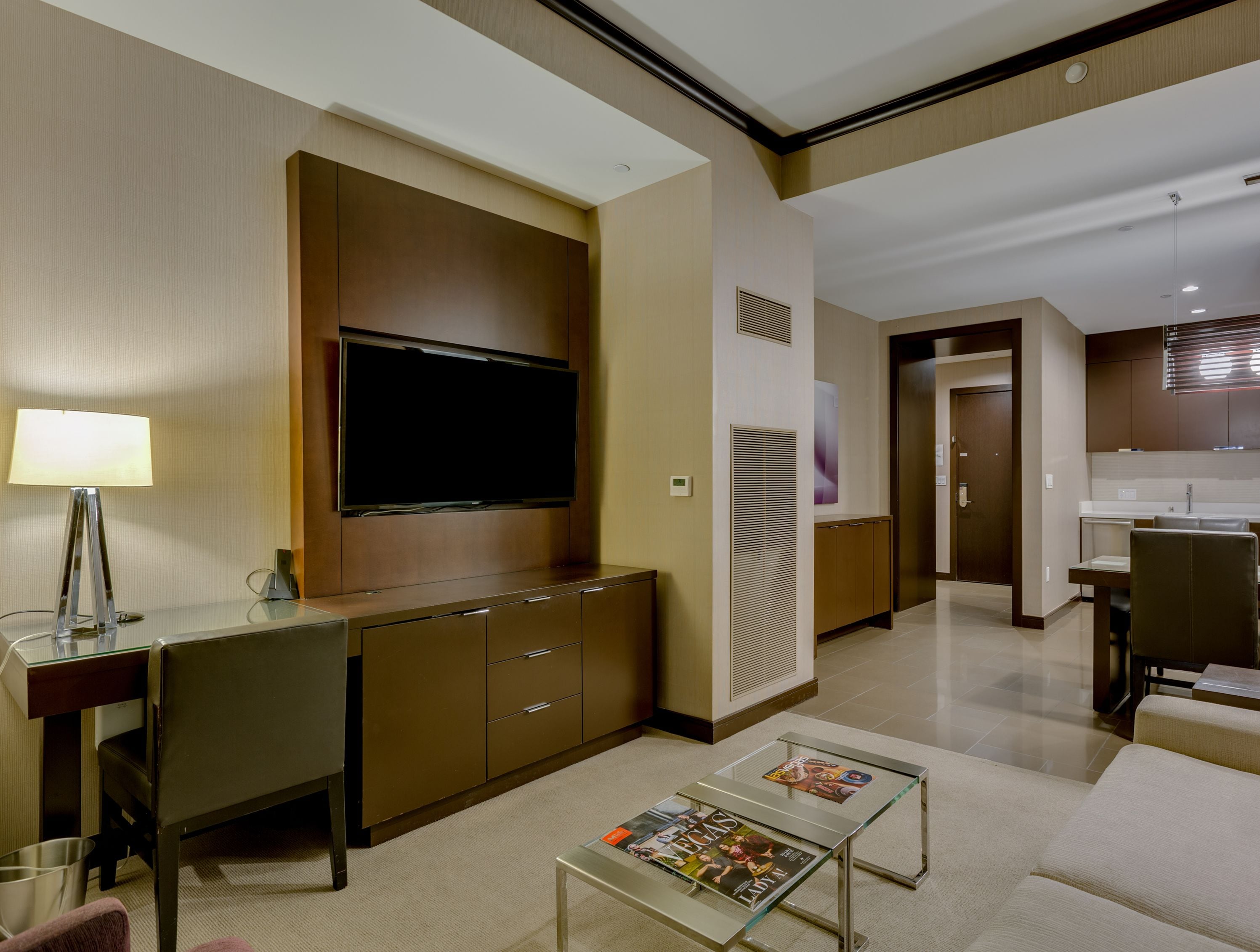 highest penthouse suite in vegas (2br) - 55th floor | living room | 45-inch flat-screen tv with cable channels, tv, tablet
