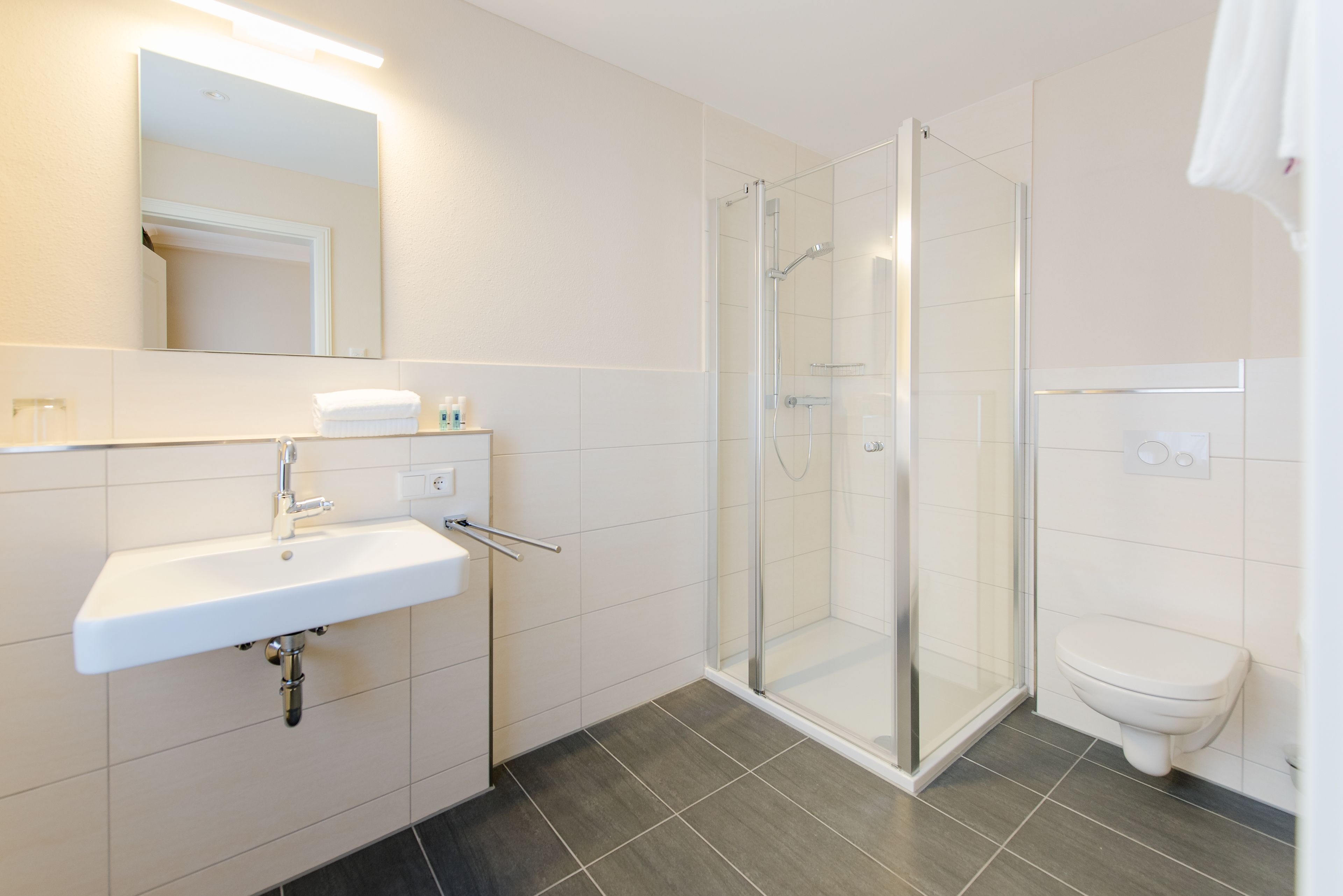 comfort single room | bathroom | shower, free toiletries, hair dryer, towels