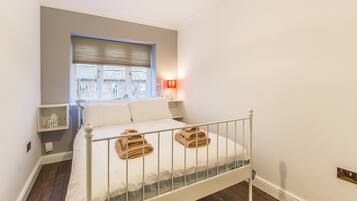 Executive Apartment, 4 Bedrooms | Desk, iron/ironing board, travel crib, free WiFi