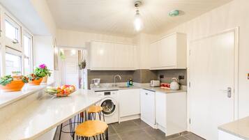 Executive Apartment, 4 Bedrooms | Private kitchen | Fridge, microwave, dishwasher, electric kettle