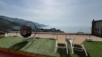 Estudio básico | Vista a la playa o el mar