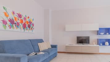 Apartment, 1 Bedroom | Living area | TV